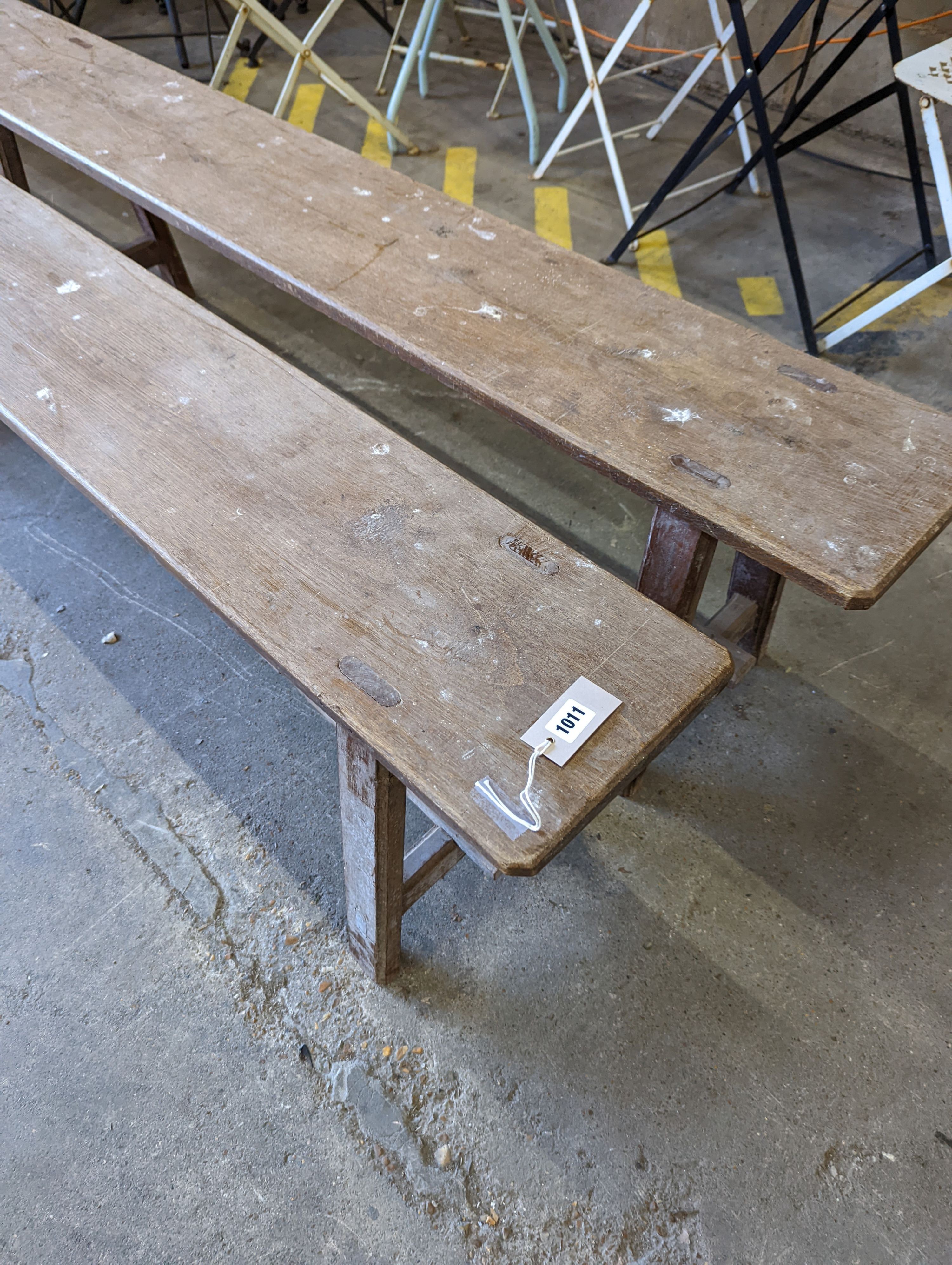 A pair of 19th century French provincial oak long bench seats, length 300cm, depth 24cm, height 45cm